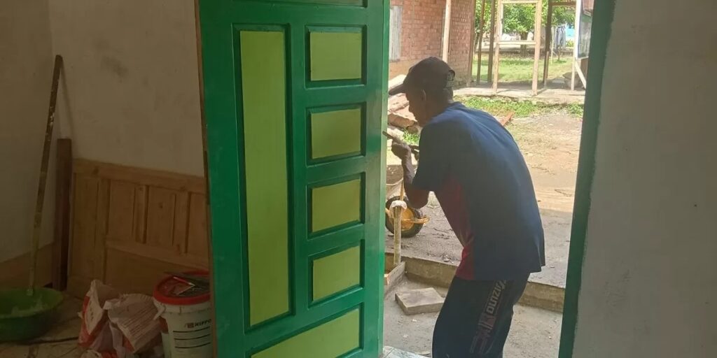 Tahap Finishing RTLH TMMD 128 Fokus Pemasangan Pintu Rumah