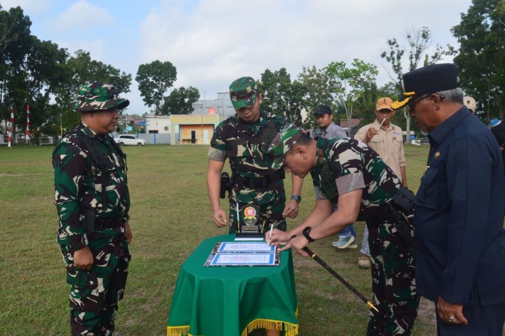 Penandatanganan Naskah Serah Terima Tandai Berakhirnya TMMD Ke-128 Kodim 1014/Pbn