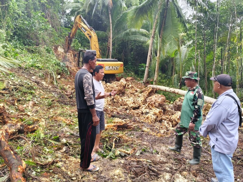 Excavator TMMD Ke-129 Berhasil Capai Titik Nol, Pembukaan Jalan di Desa Polewali Terus Digenjot