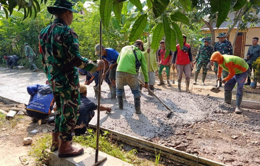 Progres Pembangunan Jalan Rabat Beton TMMD ke-129 Mencapai Setengah Target