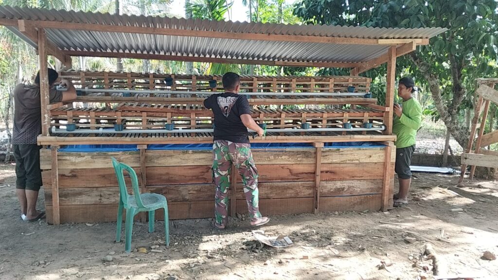 Membangun Kemandirian Keluarga Melalui Program TMMD dengan Kandang Ayam dan Kolam Lele